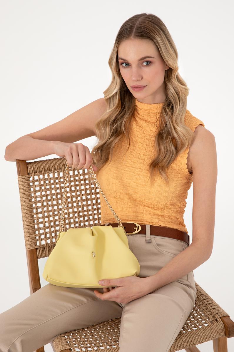 Kadın Sarı Kuzu Derisi Kol Çantası